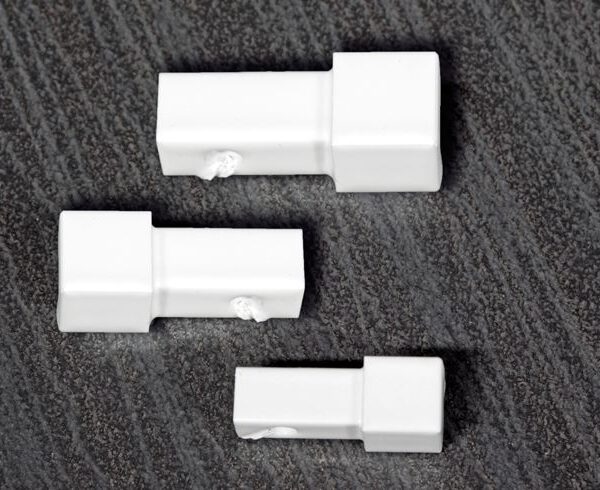 Q szögletes porfestett fehér kapszula